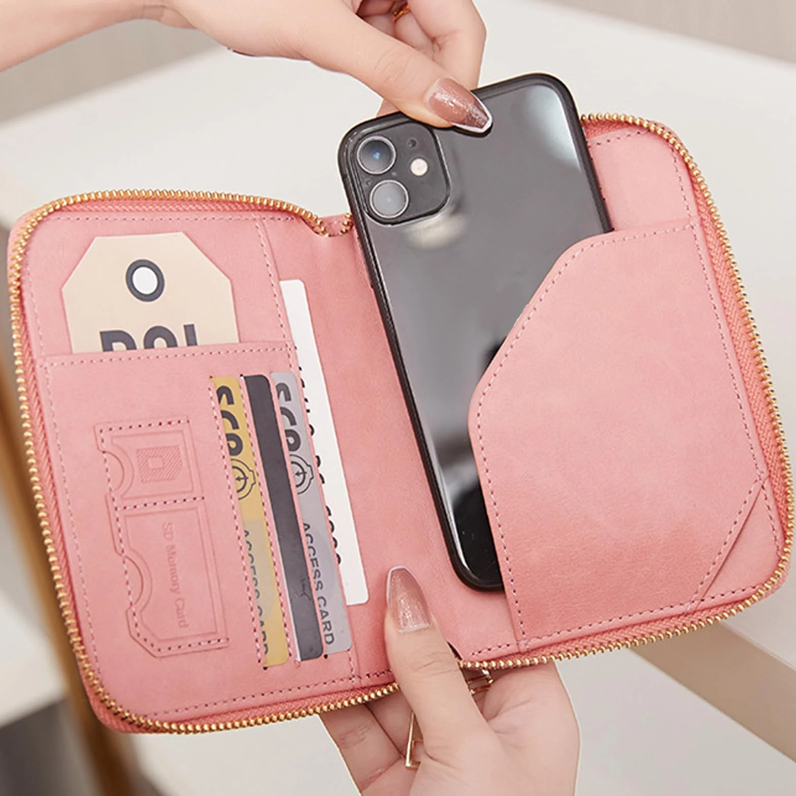 Portefeuille de voyage RFID rose similicuir avec fermeture zippée et sangle de poignet