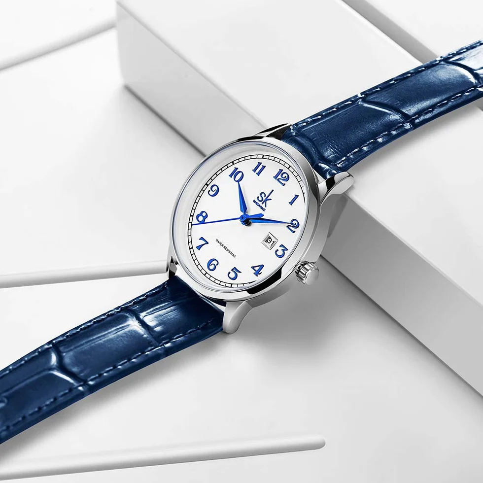 SHENGKE Montres Femme Acier Inoxydable Bracelet Cuir véritable Classique
