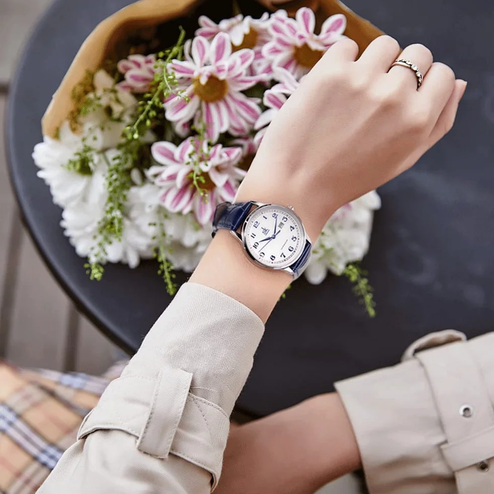 SHENGKE Montres Femme Acier Inoxydable Bracelet Cuir véritable Classique