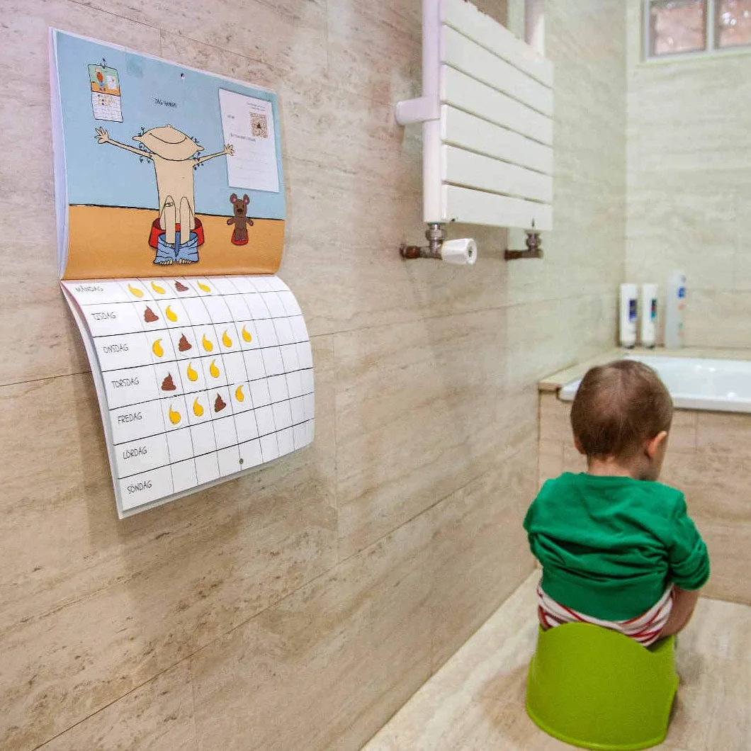 Livre d'apprentissage de la propreté pour enfant avec autocollants pipi et caca