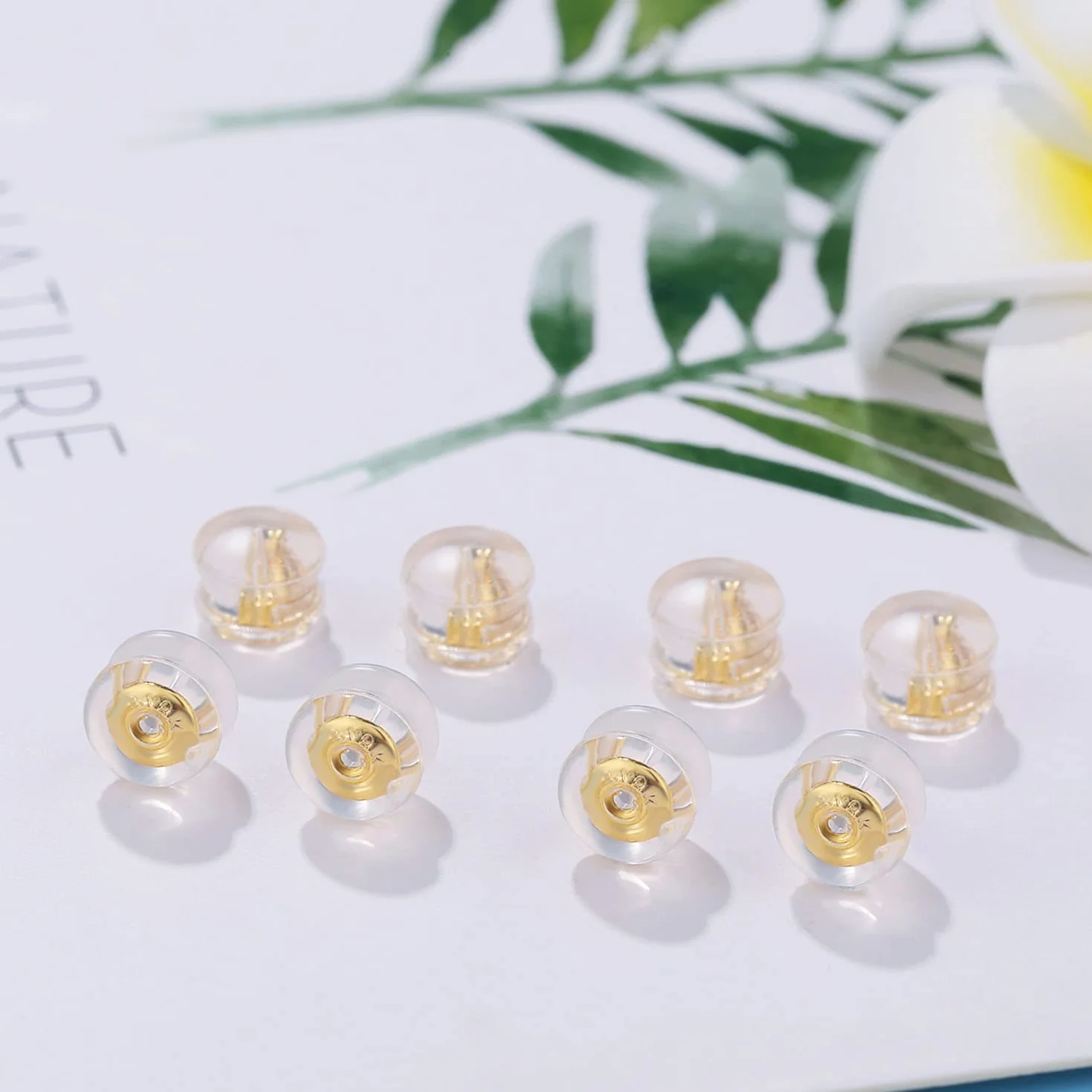 Boucles d'oreilles sécurisées en or 18 carats avec coussinets en silicone